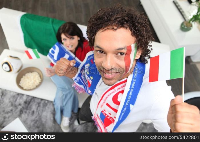 Couple supporting the Italian national team
