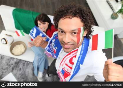 Couple supporting the Italian national team
