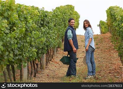Couple surrounded by vines