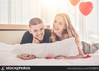 Couple sweet love live in bedroom happiness in love Valentine?s day concept