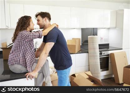 Couple Taking A Break During House Move