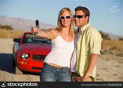 Couple Taking a Camera Phone Picture