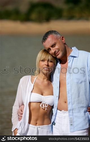 Couple taking a walk at the beach