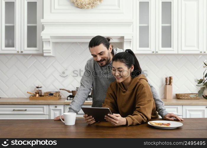 couple taking breakfast kitchen 2