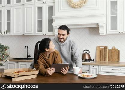 couple taking breakfast kitchen