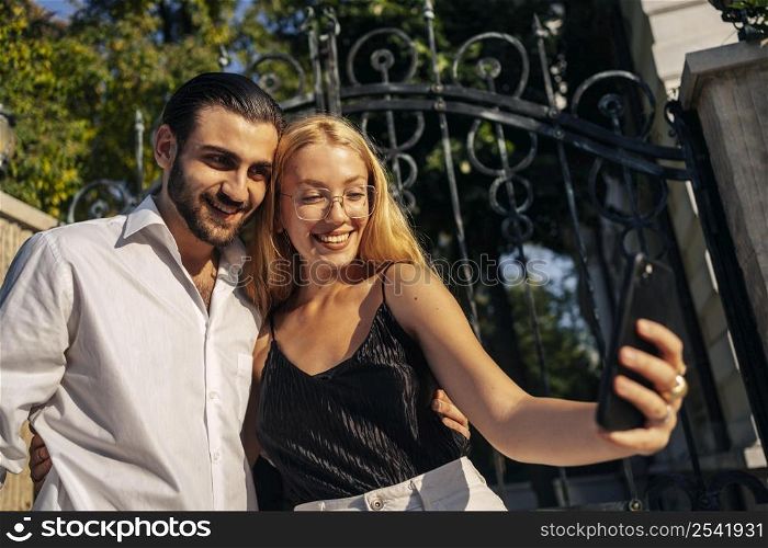 couple taking selfie together