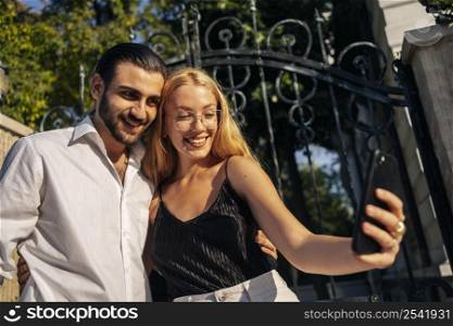 couple taking selfie together