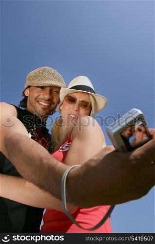 Couple taking their own photo