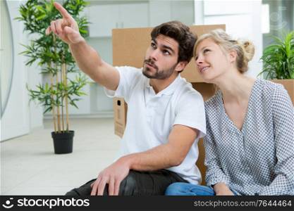 couple talking about decorating their new house