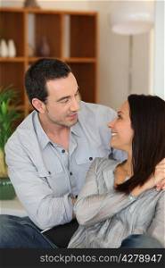 Couple talking at home