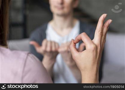 couple talking using sign language. Beautiful photo. couple talking using sign language