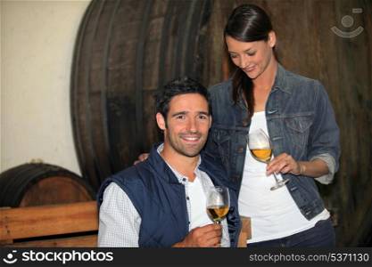 Couple tasting wine