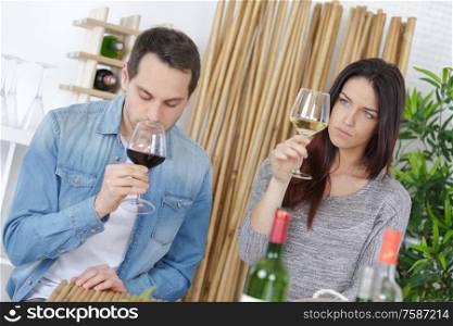 couple tasting wine in a restaurant