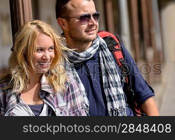 Couple traveling by backpack smiling together trip young vacation excited