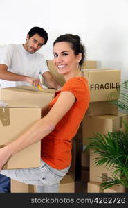 Couple unpacking their belongings