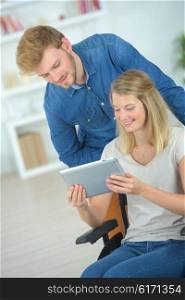 Couple using a tablet computer