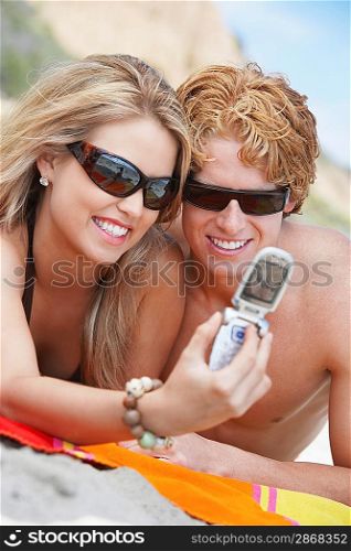 Couple Using Camera Phone