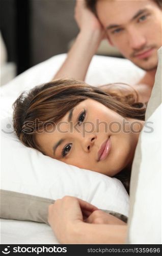 Couple waking up in the morning