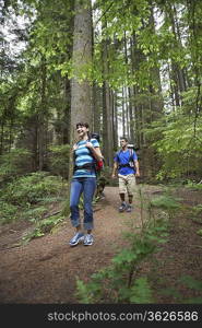 Couple walking in forest