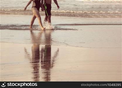 Couple walking on Gaibu beach