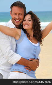 Couple walking on the beach