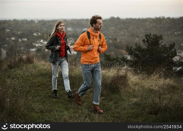 couple walking while road trip together