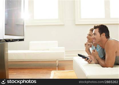 Couple Watching Plasma TV Together