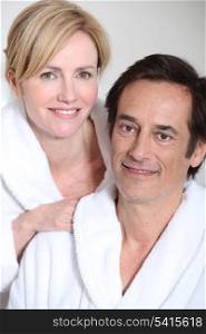 Couple wearing bath robes