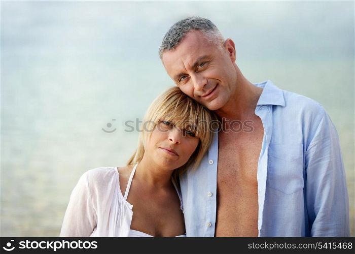 Couple wearing open shirts outdoors