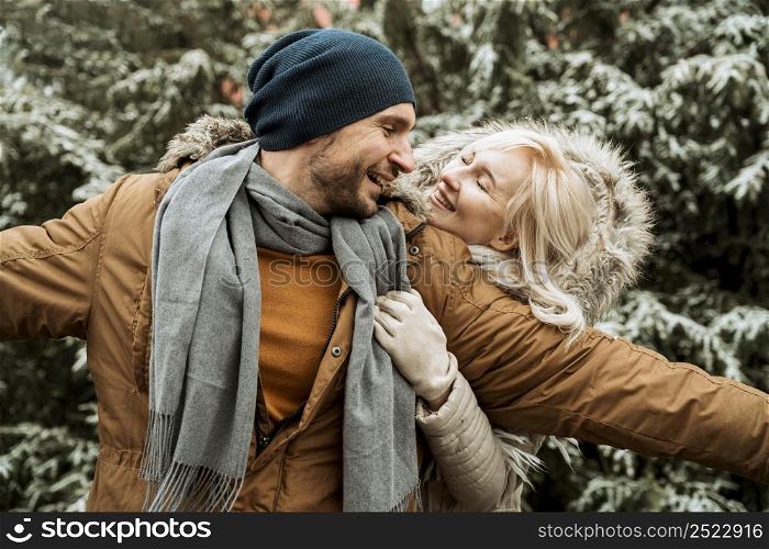couple winter being happy fooling around