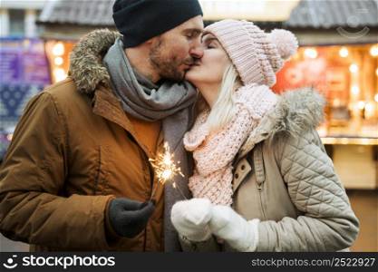 couple winter kissing