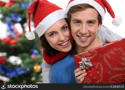 Couple with a Christmas gift