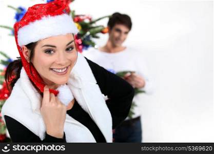 Couple with a Christmas tree