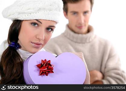 Couple with a heart shaped box
