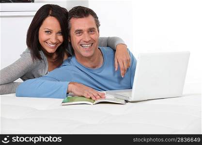 Couple with a laptop computer