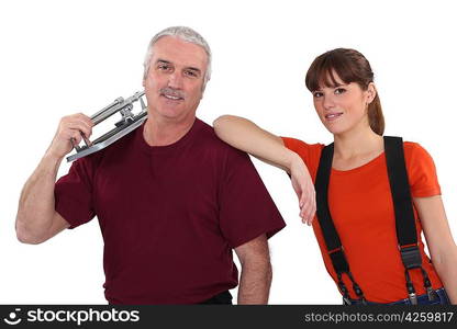 Couple with a tile cutter