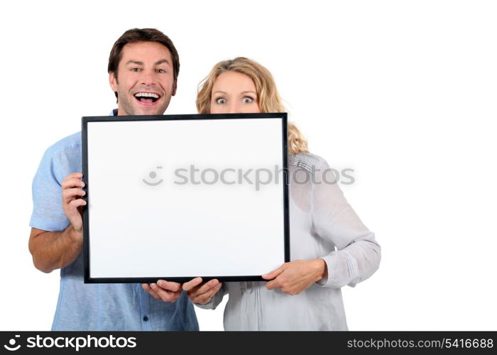 Couple with advertising board