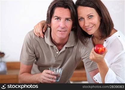 Couple with an apple