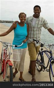 Couple With Bicycles at the Beach