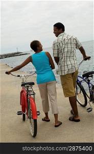 Couple With Bicycles at the Beach