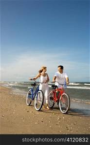 Couple with Bikes at the Beach
