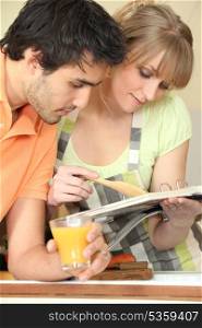 Couple with cook book