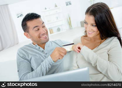 couple with credit card