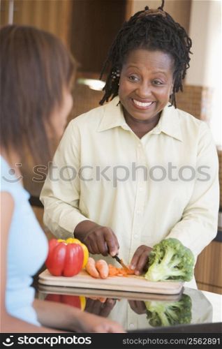 Couple With Daughter Preparing meal,mealtime