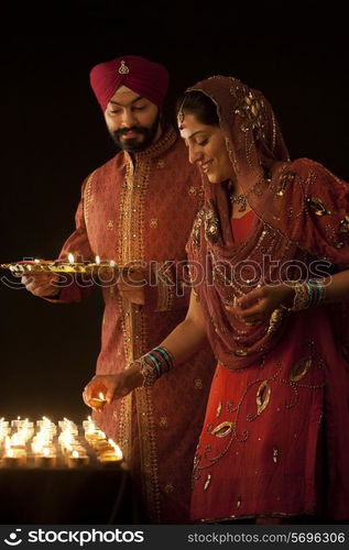 Couple with diyas