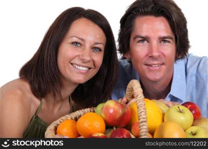 Couple with fruit basket