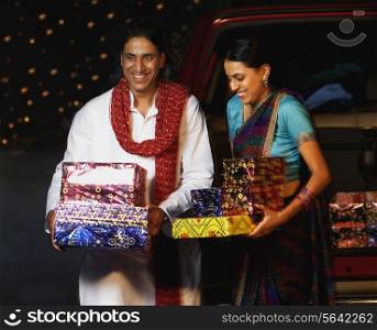 Couple with gifts on Diwali