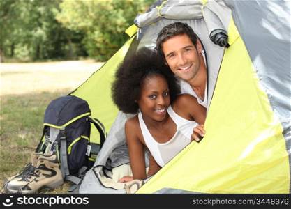 Couple with tent on camp site