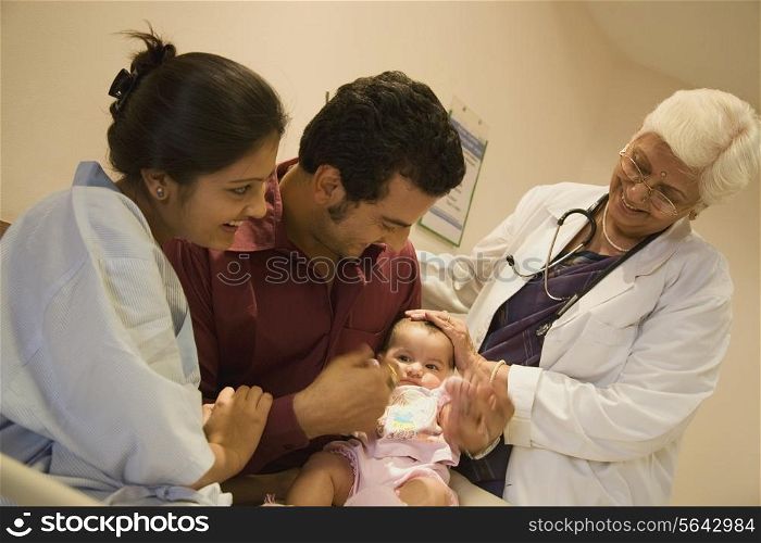 Couple with their child