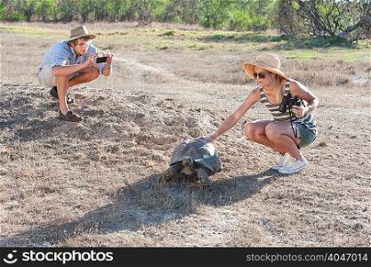 Couple with tortoise, Stellenbosch, South Africa